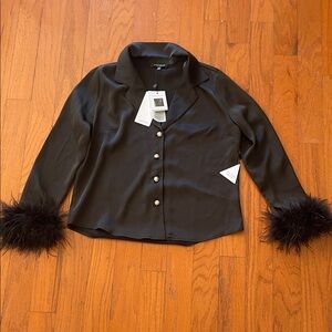 NADINE MERABI Elegant Black Blouse with Feathered Cuffs
